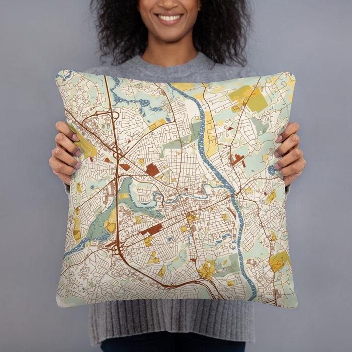 Person holding 18x18 Custom Nashua New Hampshire Map Throw Pillow in Woodblock