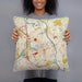 Person holding 18x18 Custom Nashua New Hampshire Map Throw Pillow in Woodblock
