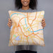 Person holding 18x18 Custom Nashville Tennessee Map Throw Pillow in Watercolor