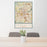 24x36 Nashville Tennessee Map Print Portrait Orientation in Woodblock Style Behind 2 Chairs Table and Potted Plant