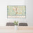 24x36 Naugatuck Connecticut Map Print Landscape Orientation in Woodblock Style Behind 2 Chairs Table and Potted Plant