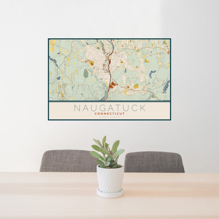 24x36 Naugatuck Connecticut Map Print Landscape Orientation in Woodblock Style Behind 2 Chairs Table and Potted Plant