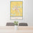 24x36 Needville Texas Map Print Portrait Orientation in Woodblock Style Behind 2 Chairs Table and Potted Plant