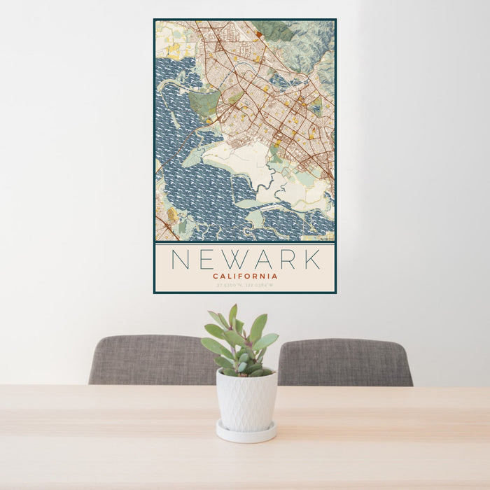 24x36 Newark California Map Print Portrait Orientation in Woodblock Style Behind 2 Chairs Table and Potted Plant