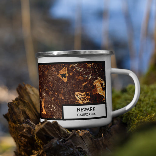 Right View Custom Newark California Map Enamel Mug in Ember on Grass With Trees in Background