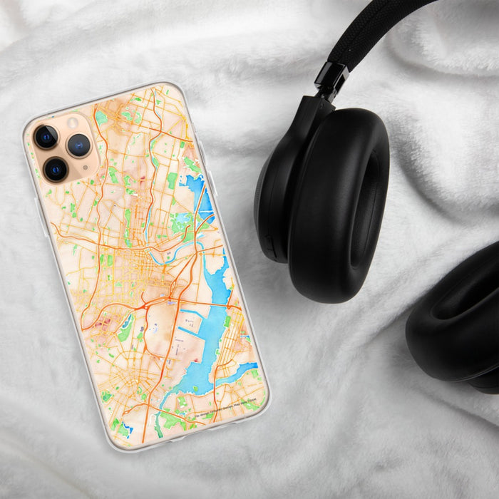 Custom Newark New Jersey Map Phone Case in Watercolor on Table with Black Headphones
