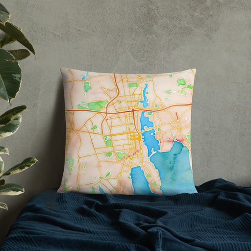 Custom New Bedford Massachusetts Map Throw Pillow in Watercolor on Bedding Against Wall