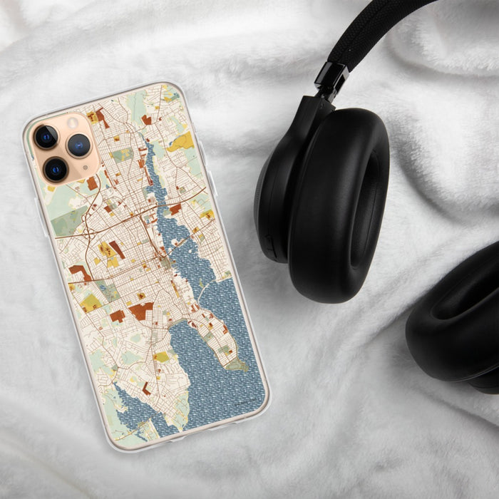Custom New Bedford Massachusetts Map Phone Case in Woodblock on Table with Black Headphones