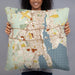 Person holding 22x22 Custom New Bedford Massachusetts Map Throw Pillow in Woodblock