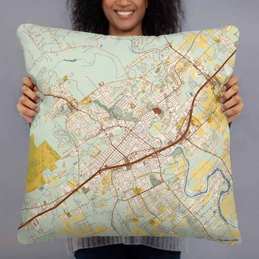 Person holding 22x22 Custom New Braunfels Texas Map Throw Pillow in Woodblock