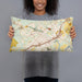 Person holding 20x12 Custom New Braunfels Texas Map Throw Pillow in Woodblock