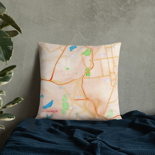 Custom New Britain Connecticut Map Throw Pillow in Watercolor on Bedding Against Wall