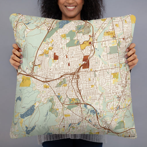 Person holding 22x22 Custom New Britain Connecticut Map Throw Pillow in Woodblock