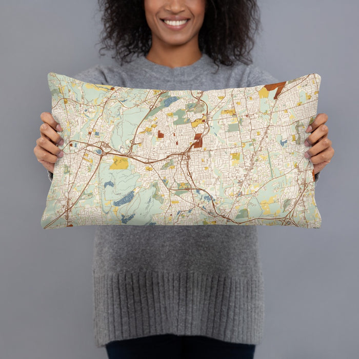 Person holding 20x12 Custom New Britain Connecticut Map Throw Pillow in Woodblock