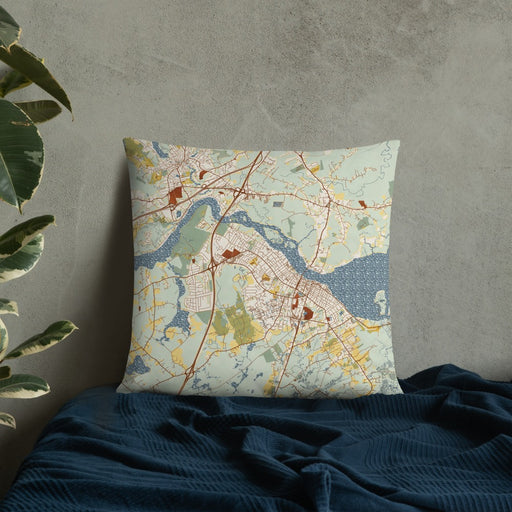 Custom Newburyport Massachusetts Map Throw Pillow in Woodblock on Bedding Against Wall