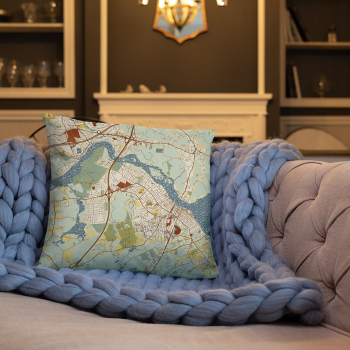 Custom Newburyport Massachusetts Map Throw Pillow in Woodblock on Cream Colored Couch