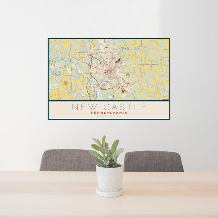 24x36 New Castle Pennsylvania Map Print Lanscape Orientation in Woodblock Style Behind 2 Chairs Table and Potted Plant