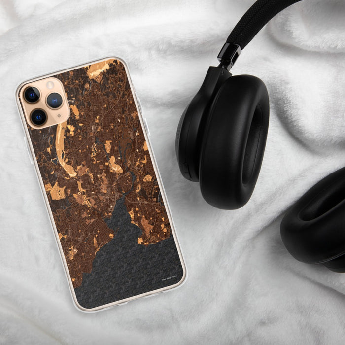 Custom New Haven Connecticut Map Phone Case in Ember on Table with Black Headphones