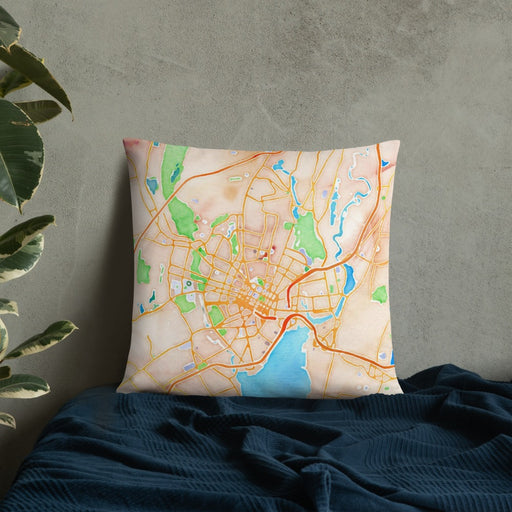 Custom New Haven Connecticut Map Throw Pillow in Watercolor on Bedding Against Wall
