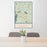 24x36 New London New Hampshire Map Print Portrait Orientation in Woodblock Style Behind 2 Chairs Table and Potted Plant