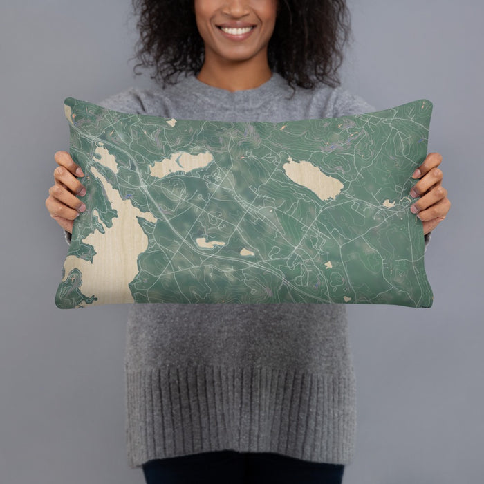 Person holding 20x12 Custom New London New Hampshire Map Throw Pillow in Afternoon