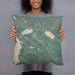 Person holding 18x18 Custom New London New Hampshire Map Throw Pillow in Afternoon