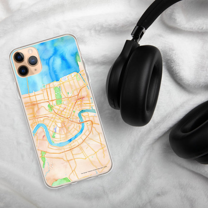 Custom New Orleans Louisiana Map Phone Case in Watercolor on Table with Black Headphones