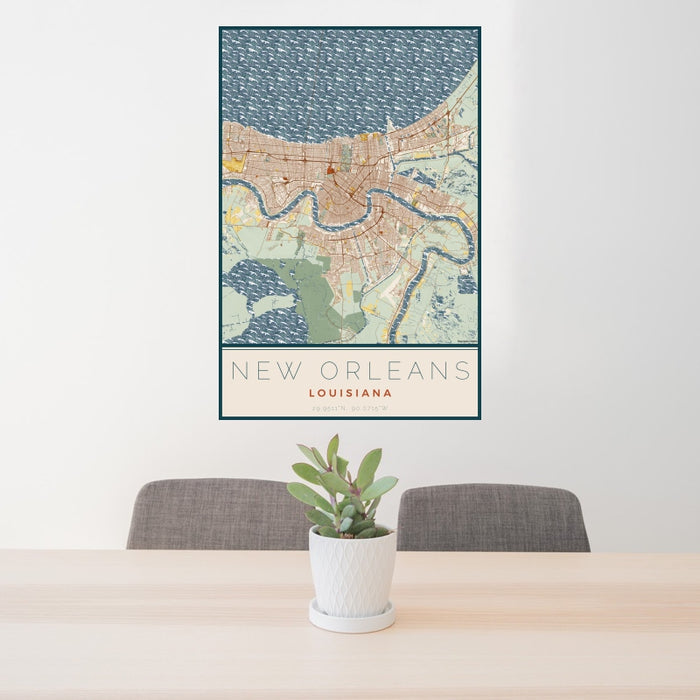 24x36 New Orleans Louisiana Map Print Portrait Orientation in Woodblock Style Behind 2 Chairs Table and Potted Plant
