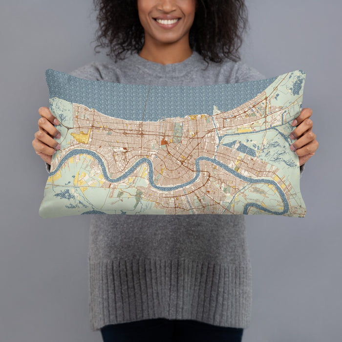 Person holding 20x12 Custom New Orleans Louisiana Map Throw Pillow in Woodblock