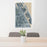24x36 New Smyrna Beach Florida Map Print Portrait Orientation in Afternoon Style Behind 2 Chairs Table and Potted Plant
