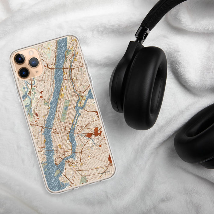 Custom New York New York Map Phone Case in Woodblock on Table with Black Headphones