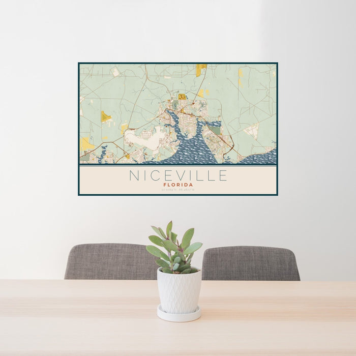 24x36 Niceville Florida Map Print Landscape Orientation in Woodblock Style Behind 2 Chairs Table and Potted Plant
