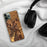 Custom Noblesville Indiana Map Phone Case in Ember on Table with Black Headphones