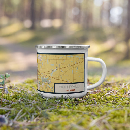 Right View Custom Noblesville Indiana Map Enamel Mug in Woodblock on Grass With Trees in Background