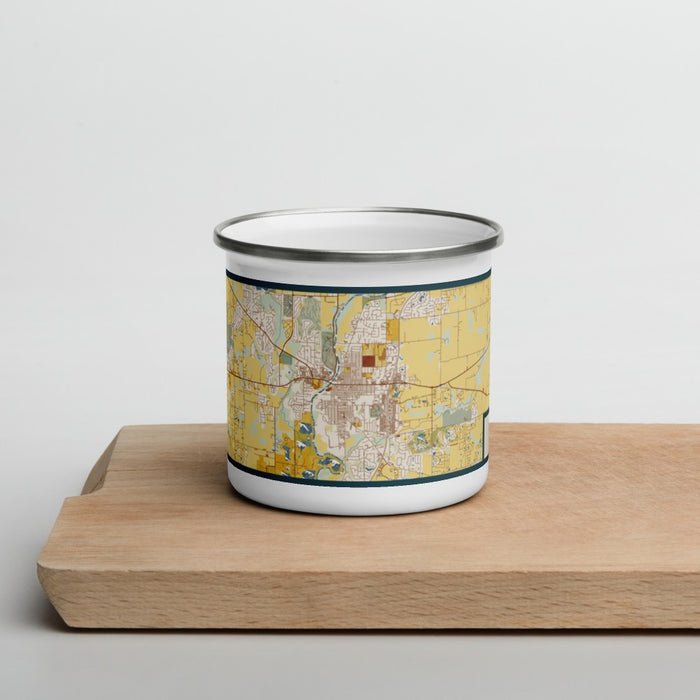 Front View Custom Noblesville Indiana Map Enamel Mug in Woodblock on Cutting Board