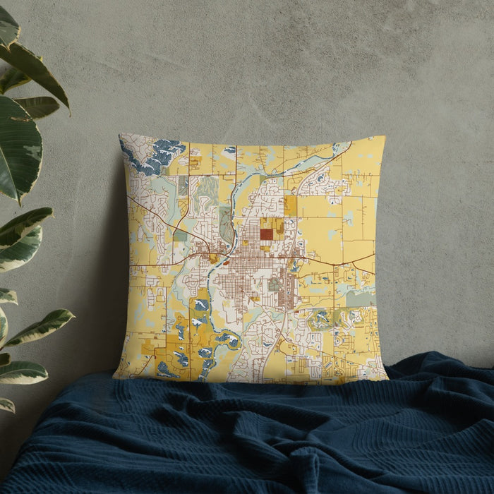 Custom Noblesville Indiana Map Throw Pillow in Woodblock on Bedding Against Wall