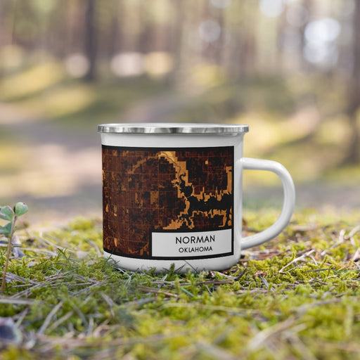 Right View Custom Norman Oklahoma Map Enamel Mug in Ember on Grass With Trees in Background