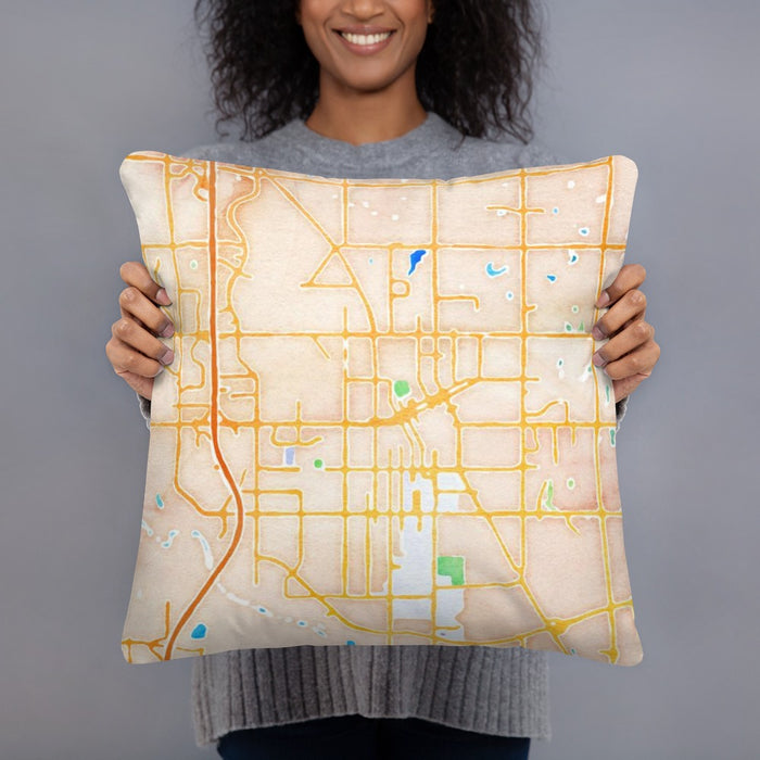 Person holding 18x18 Custom Norman Oklahoma Map Throw Pillow in Watercolor