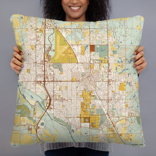 Person holding 22x22 Custom Norman Oklahoma Map Throw Pillow in Woodblock