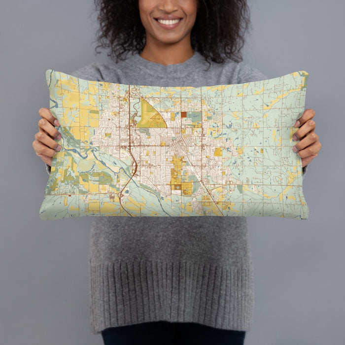 Person holding 20x12 Custom Norman Oklahoma Map Throw Pillow in Woodblock