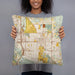 Person holding 18x18 Custom Norman Oklahoma Map Throw Pillow in Woodblock