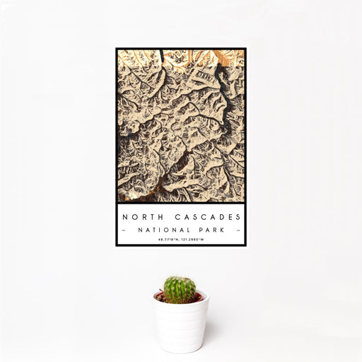 12x18 North Cascades National Park Map Print Portrait Orientation in Ember Style With Small Cactus Plant in White Planter