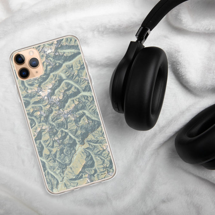 Custom North Cascades National Park Map Phone Case in Woodblock on Table with Black Headphones