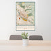 24x36 North End Boise Map Print Portrait Orientation in Woodblock Style Behind 2 Chairs Table and Potted Plant