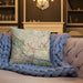 Custom North Little Rock Arkansas Map Throw Pillow in Woodblock on Cream Colored Couch