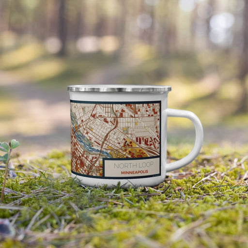 Right View Custom North Loop Minneapolis Map Enamel Mug in Woodblock on Grass With Trees in Background
