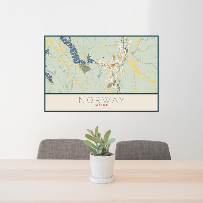 24x36 Norway Maine Map Print Landscape Orientation in Woodblock Style Behind 2 Chairs Table and Potted Plant