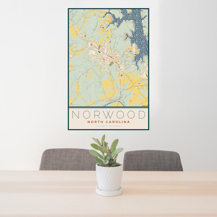 24x36 Norwood North Carolina Map Print Portrait Orientation in Woodblock Style Behind 2 Chairs Table and Potted Plant