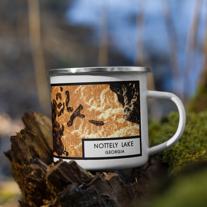 Right View Custom Nottely Lake Georgia Map Enamel Mug in Ember on Grass With Trees in Background