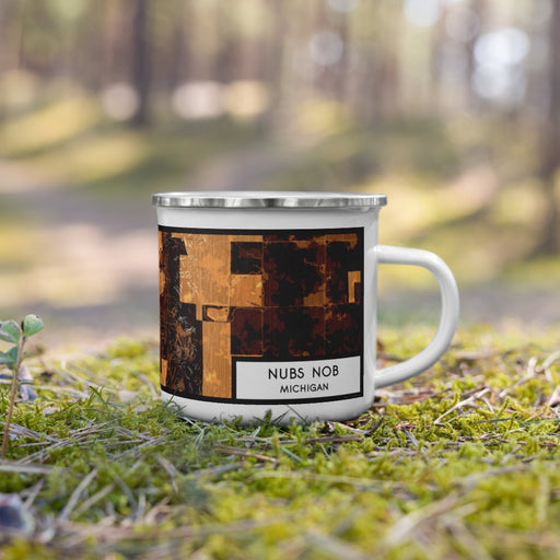Right View Custom Nubs Nob Michigan Map Enamel Mug in Ember on Grass With Trees in Background